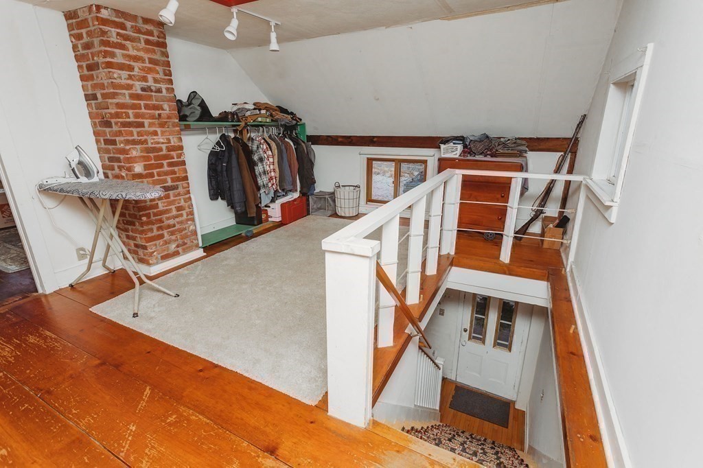 269 Ashfield Road Conway, MA 01341 - Photo 17 of 25 a view of walk in closet with clothes and shoes