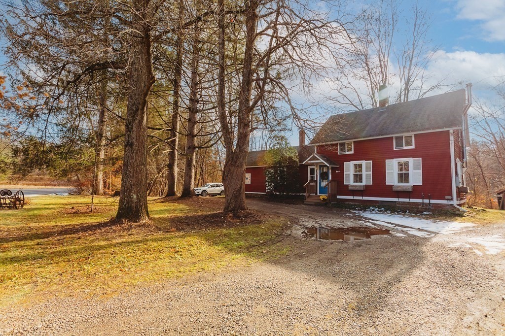 269 Ashfield Road Conway, MA 01341 - Photo 2 of 25 a view of a house with a yard covered in snow