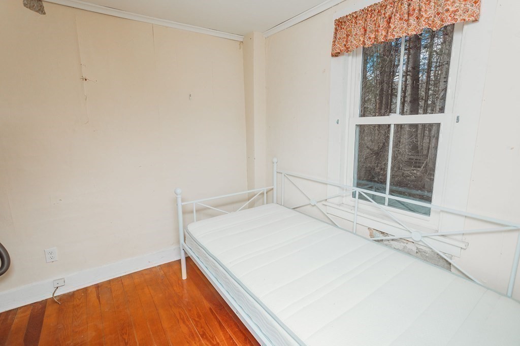 269 Ashfield Road Conway, MA 01341 - Photo 6 of 25 a room with a bed and a window