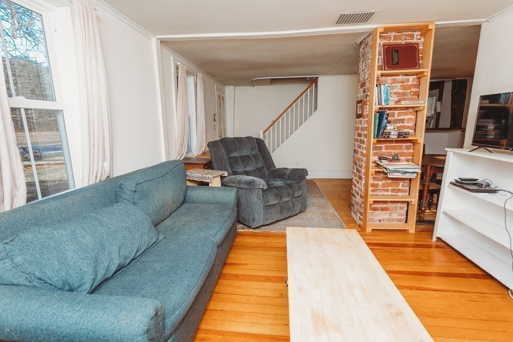 269 Ashfield Road Conway, MA 01341 - Photo 7 of 25 a living room with furniture rug and wooden floor