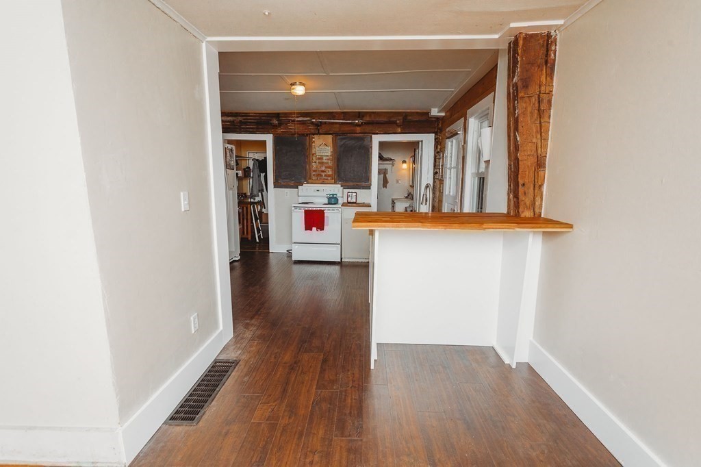 269 Ashfield Road Conway, MA 01341 - Photo 9 of 25 a view of hallway with wooden floor