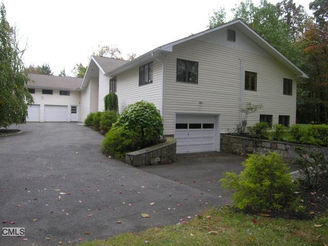 48 Aunt Hack Road Danbury, CT 06811 - Photo 1 of 1 a view of a house with a yard