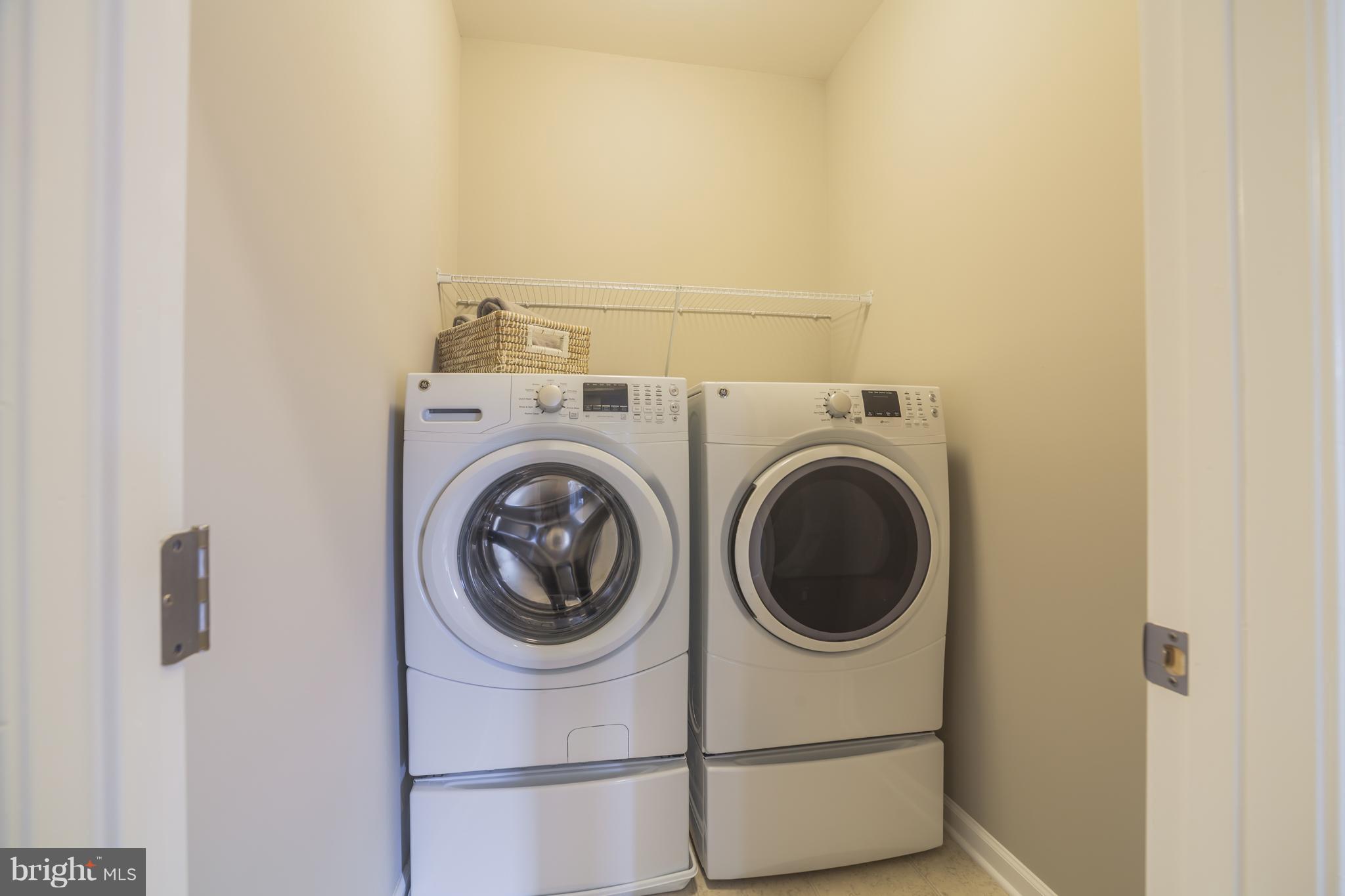 8295 Kippis Road Millersville, MD 21108 - Photo 17 of 28 a utility room with dryer and washer