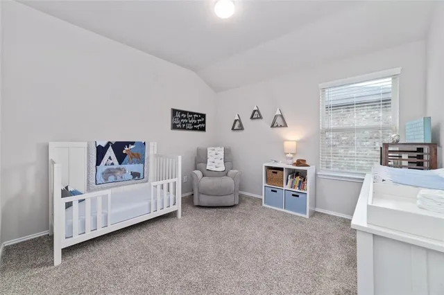 a bedroom with furniture and a couch