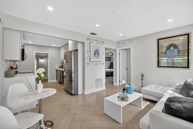a living room with furniture and a table