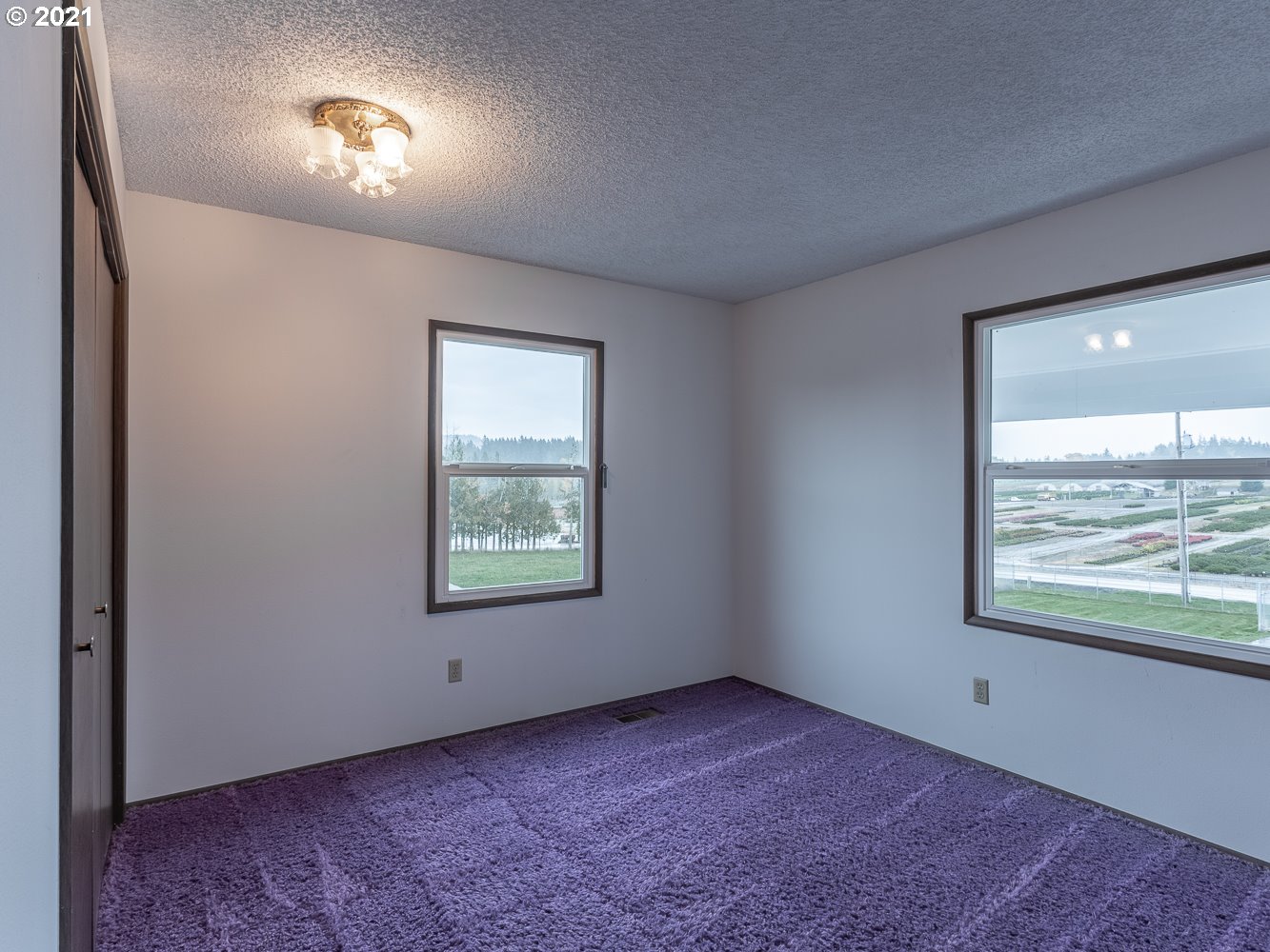 22835 Southeast Tillstrom Road Damascus, OR 97089 - Photo 21 of 32 an empty room with a window