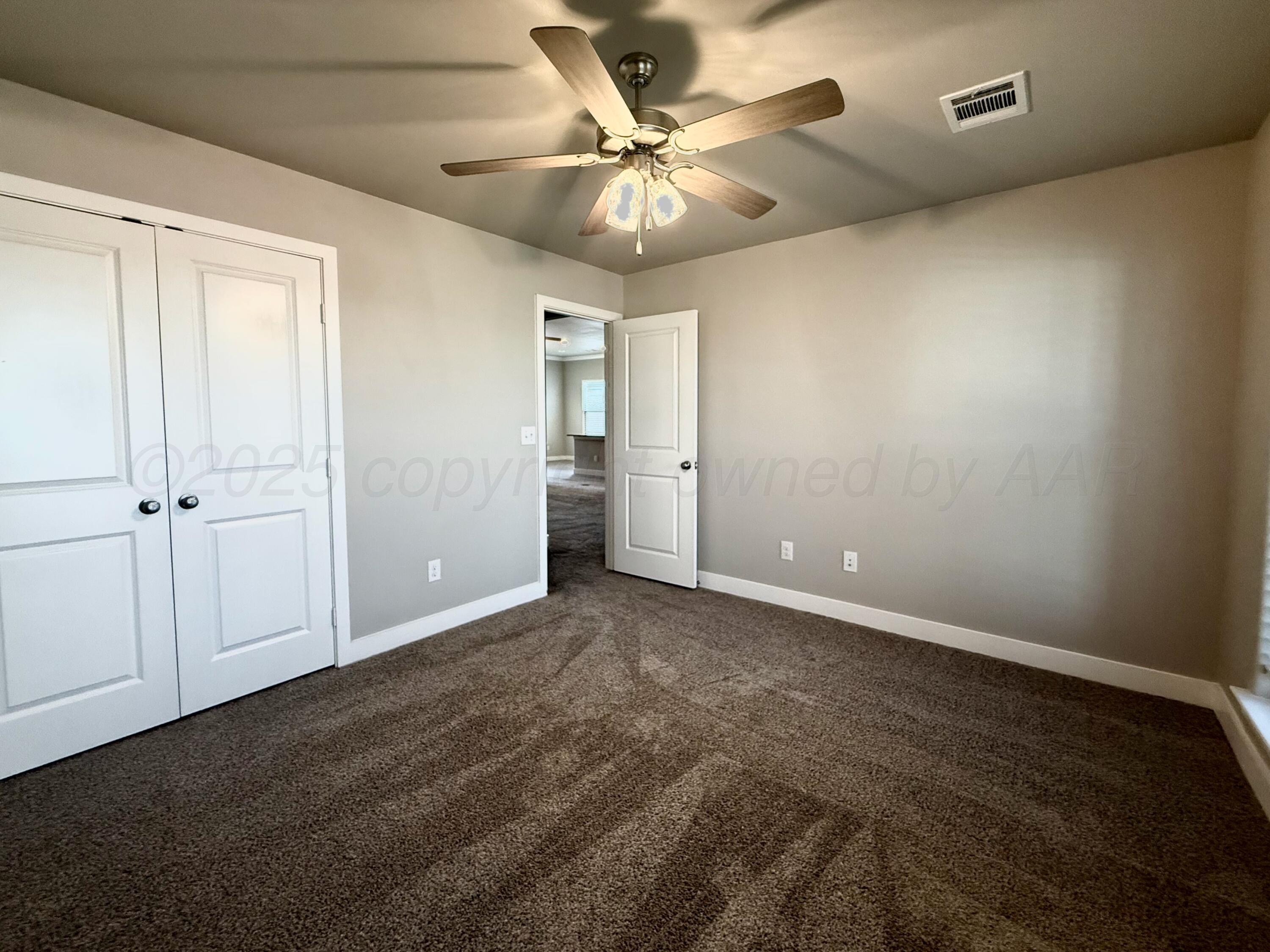 7013 Mercury Trail Amarillo, TX 79118 - Photo 11 of 23 wooden floor in an empty room