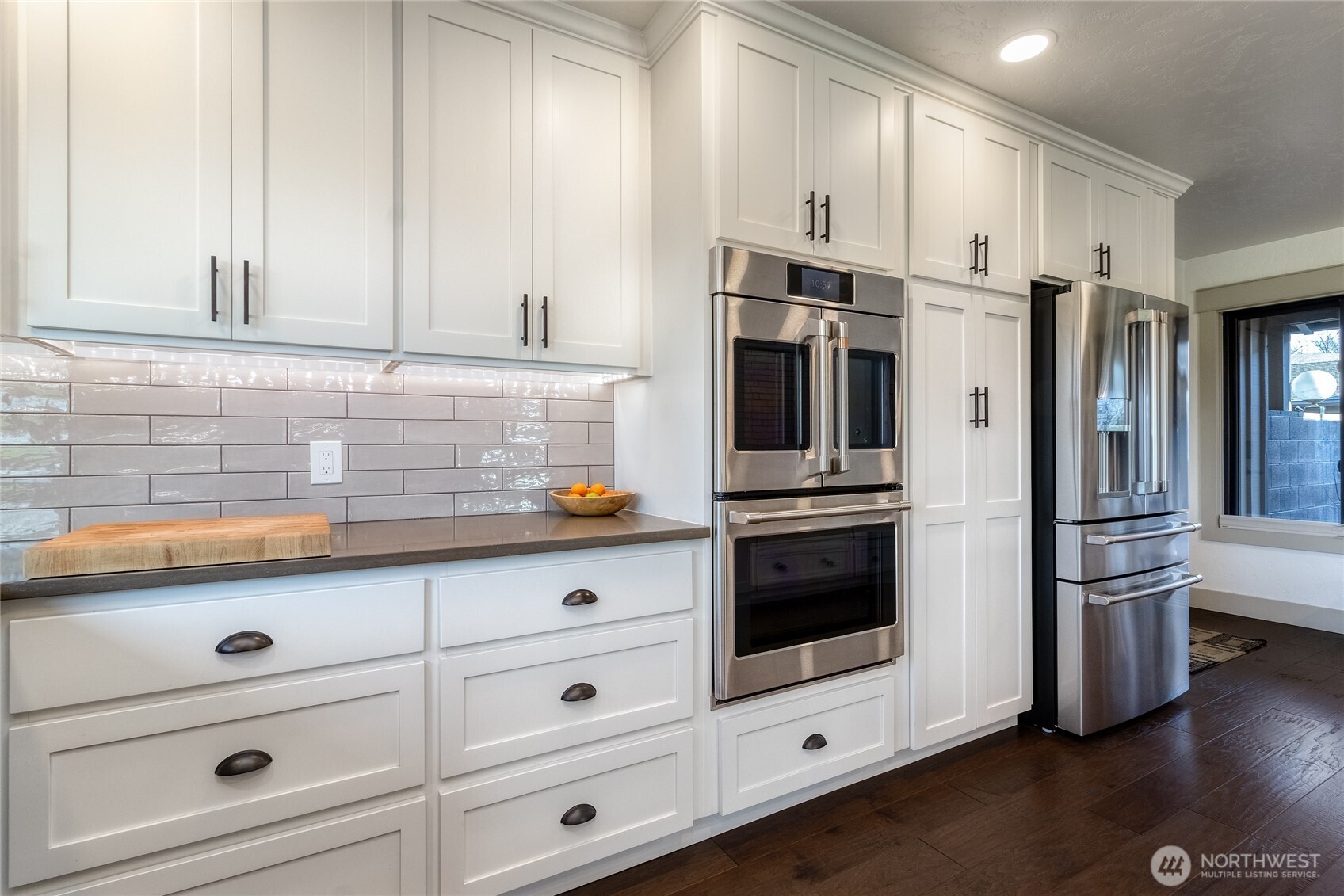 619 Country Club Road Walla Walla, WA 99362 - Photo 13 of 33 a kitchen with stainless steel appliances a stove and a refrigerator