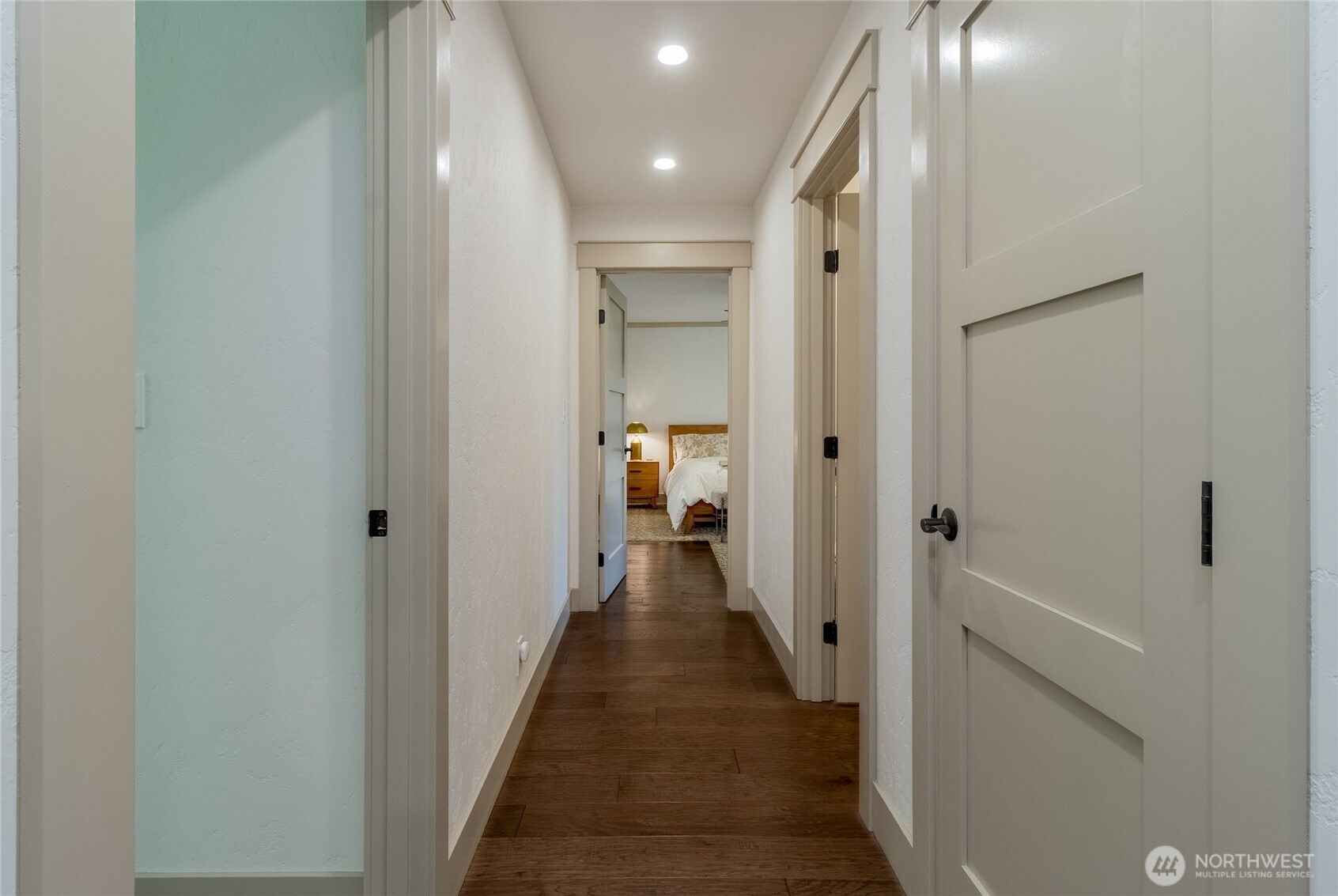 619 Country Club Road Walla Walla, WA 99362 - Photo 17 of 33 a view of a hallway with a livingroom and a bathroom with a sink