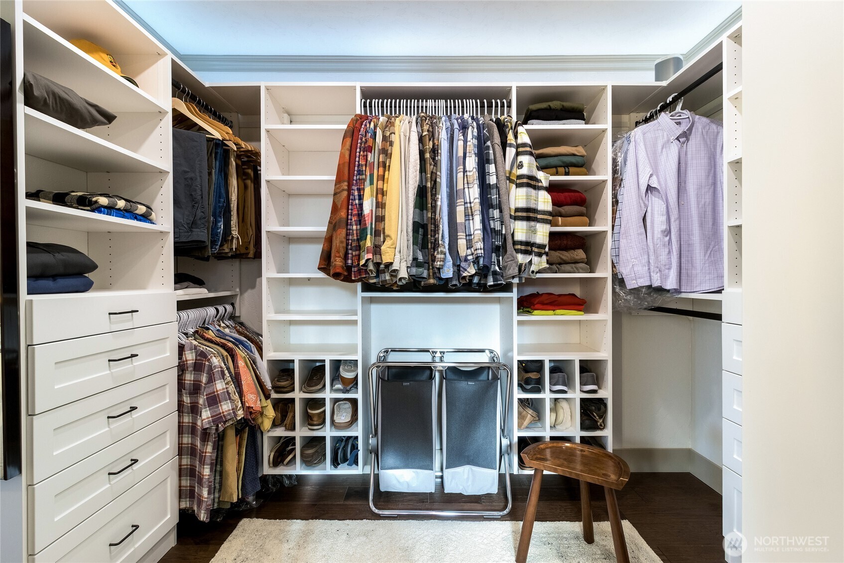 619 Country Club Road Walla Walla, WA 99362 - Photo 23 of 33 a view of walk in closet with clothes and shoes