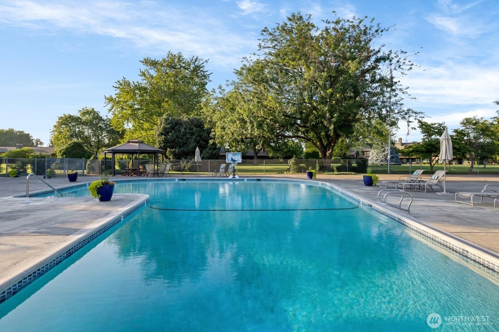 619 Country Club Road Walla Walla, WA 99362 - Photo 39 of 39 a view of yard with swimming pool and trees in the background