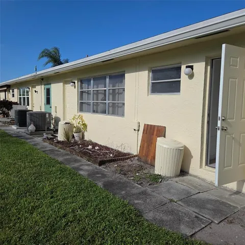 a front view of a house with patio