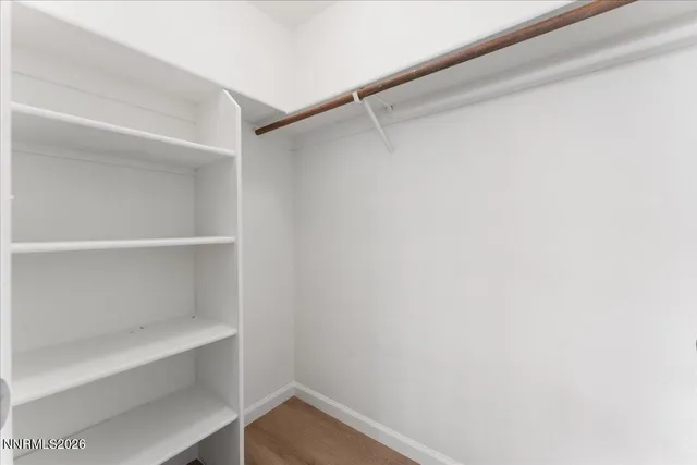 a view of an empty walk in closet