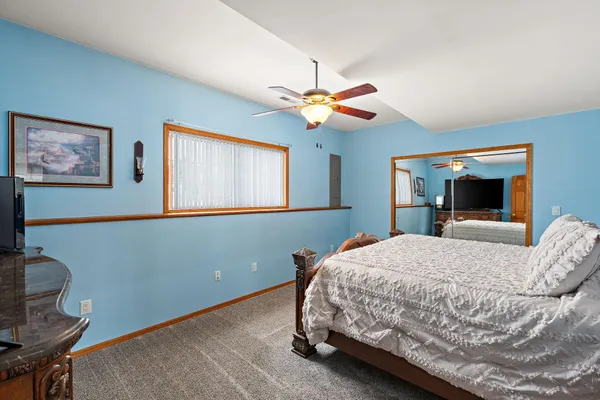 a kitchen with lots of counter top space and wooden floor