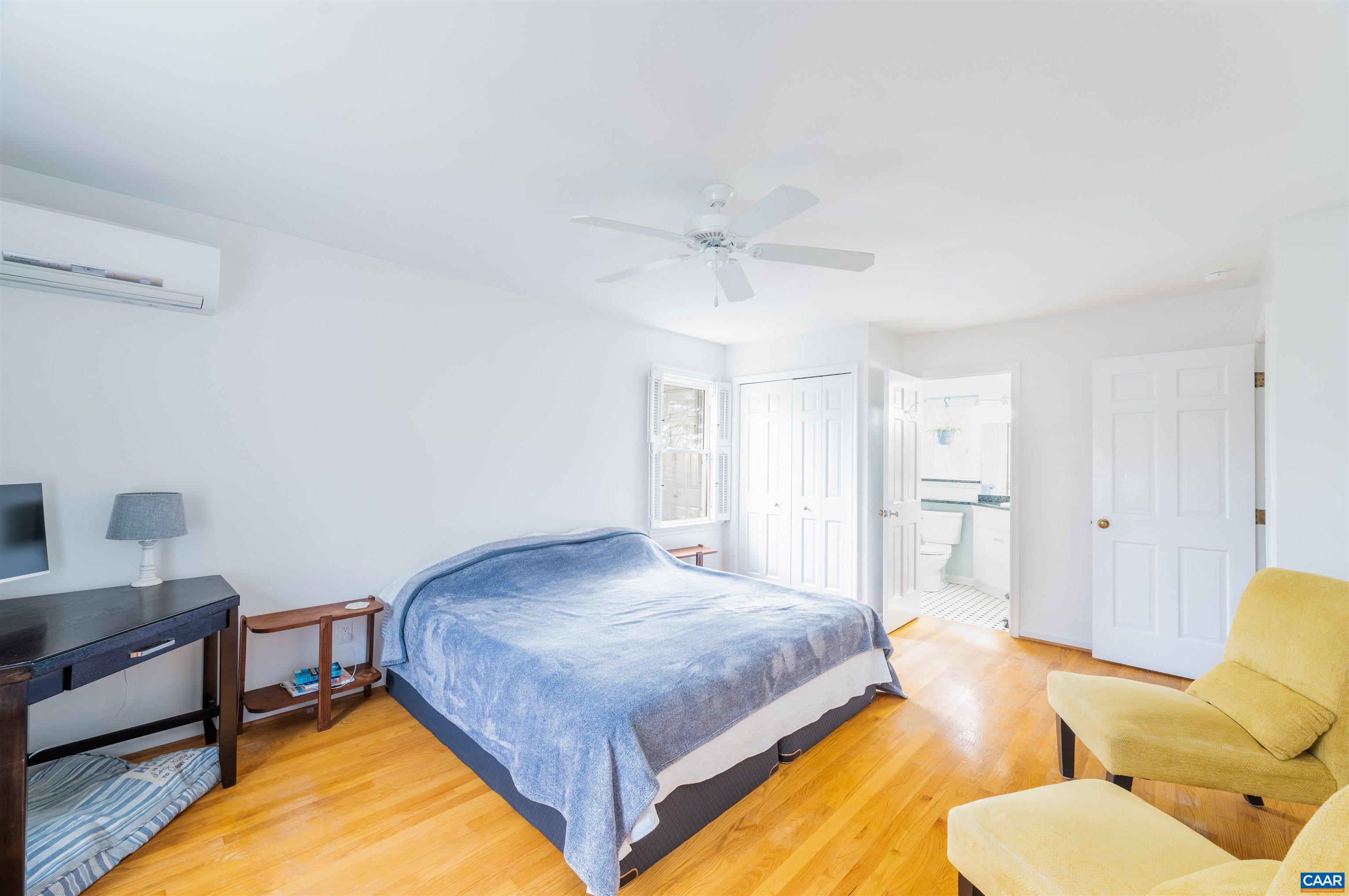 2403 Bennington Road Charlottesville, VA 22901 - Photo 17 of 31 a spacious bedroom with a bed and furniture