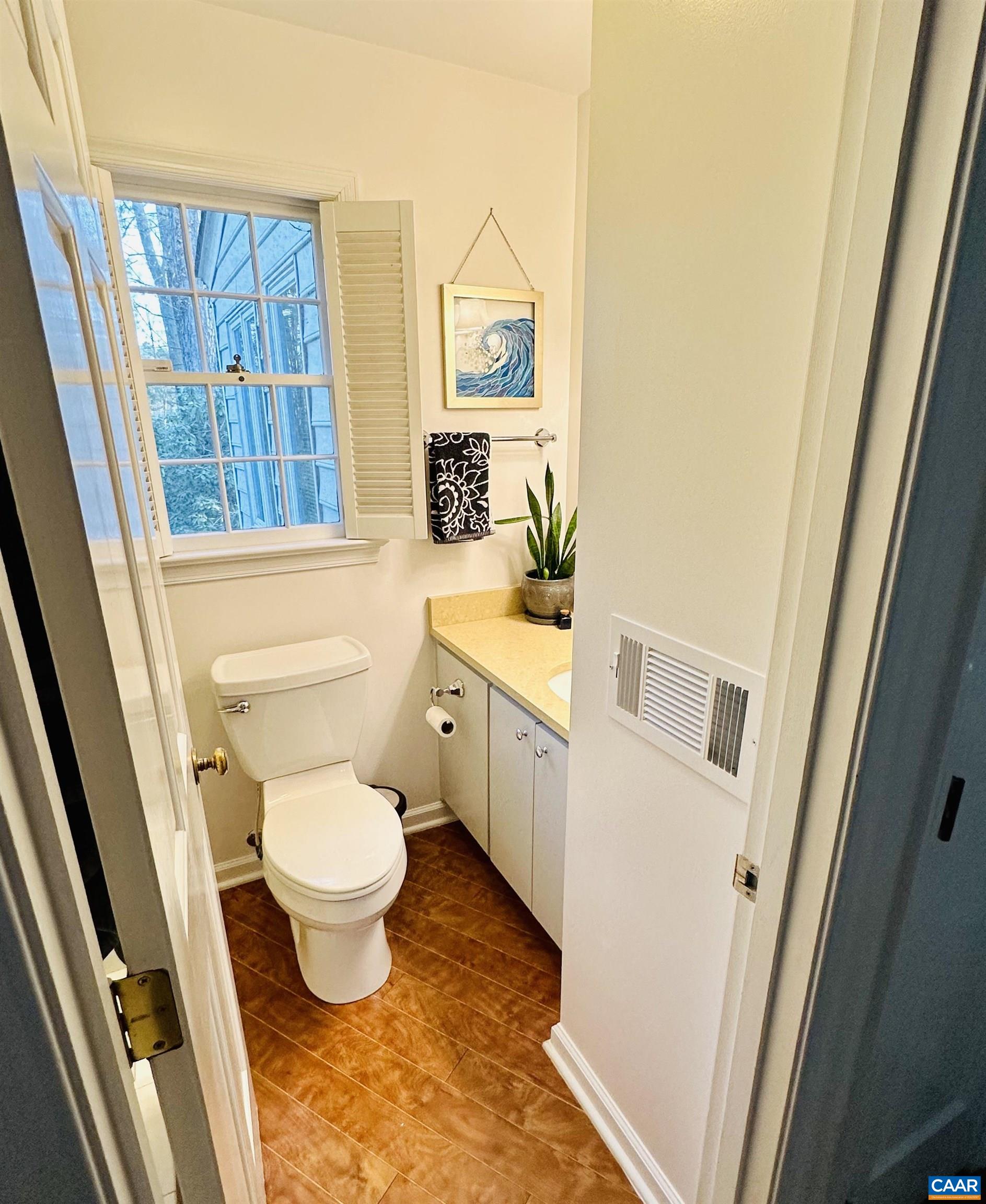 2403 Bennington Road Charlottesville, VA 22901 - Photo 22 of 31 a bathroom with a toilet sink and tub