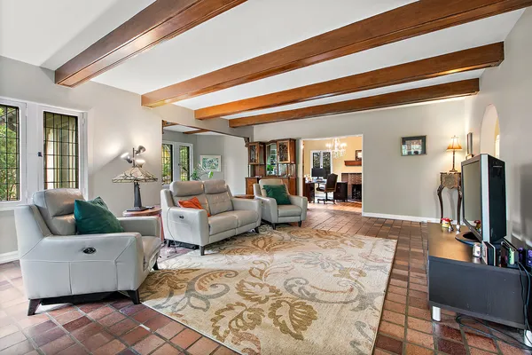 a view of a livingroom with furniture and a fireplace