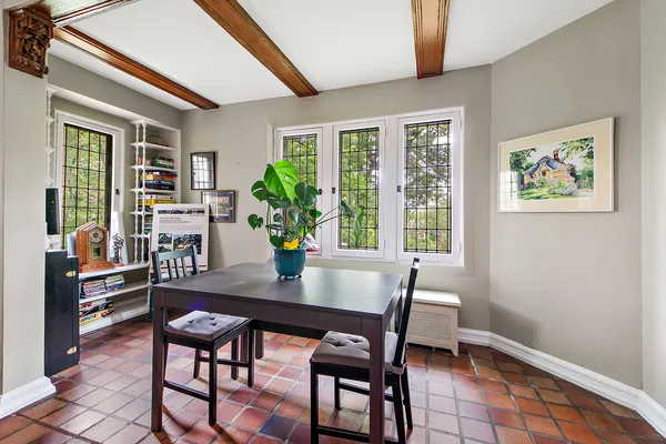 a kitchen with stainless steel appliances granite countertop a sink a stove and a wooden floors