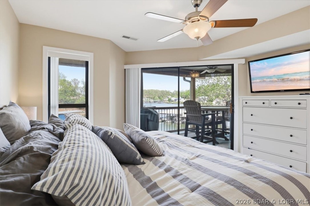 158 Willow Ridge Point, Unit 3C Lake Ozark, MO 65049 - Photo 15 of 25 Deck access from primary bedroom