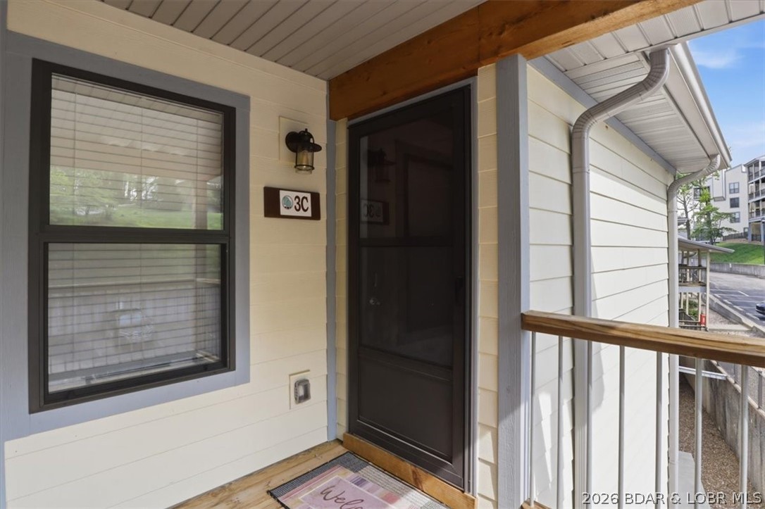 158 Willow Ridge Point, Unit 3C Lake Ozark, MO 65049 - Photo 2 of 25 Outside torage to the left of front door