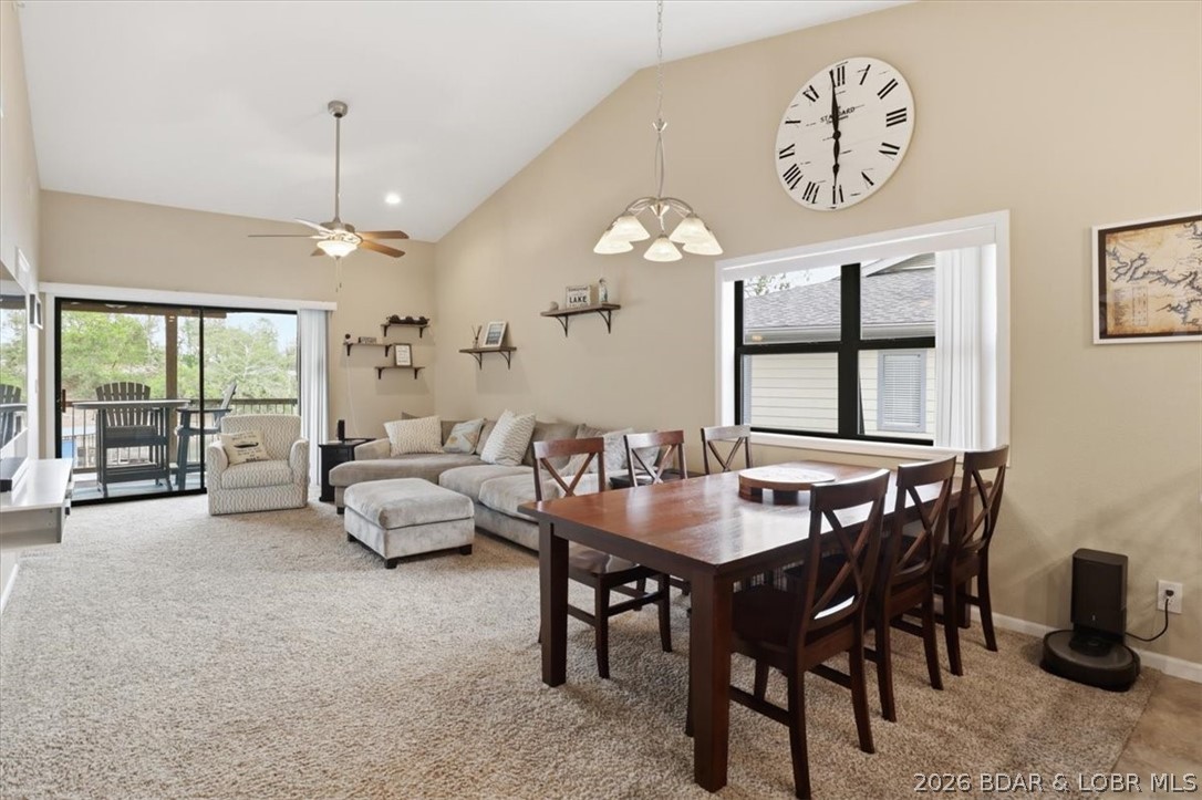 158 Willow Ridge Point, Unit 3C Lake Ozark, MO 65049 - Photo 7 of 25 Open living area with access to deck