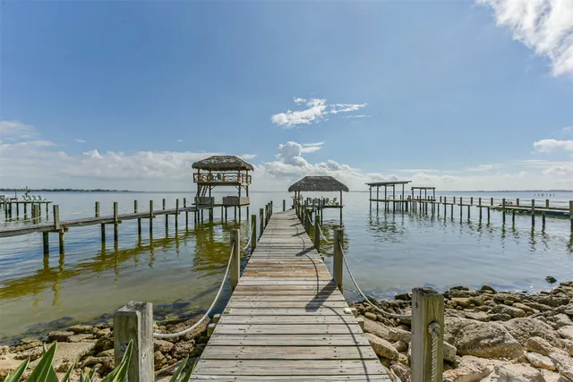 an aerial view of a houses with outdoor space