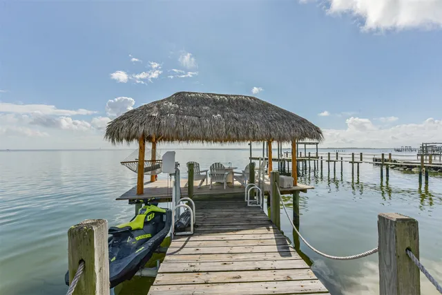 a view of a chairs and table in a room