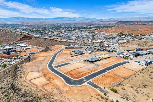 Undisclosed Address St. George, UT 84770 - Photo 3 of 10 Developed residential area featuring paved streets and established homes amidst desert landscaping