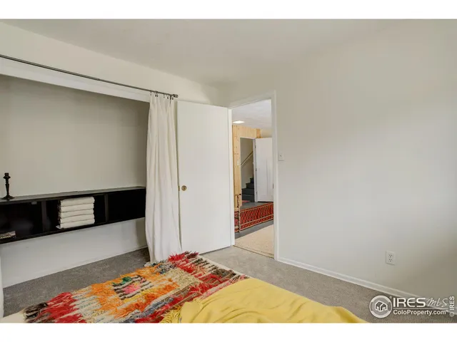 a bedroom with a bed