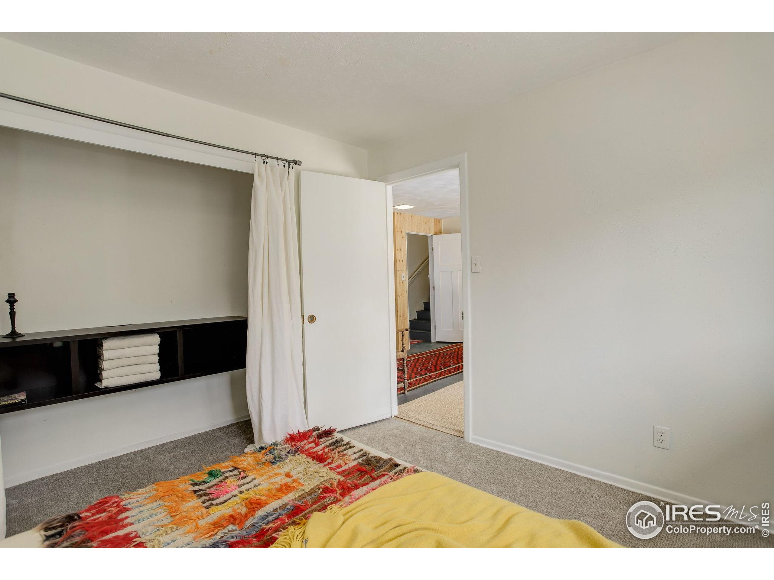 4 Porphyry View Jamestown, CO 80455 - Photo 26 of 36 a bedroom with a bed