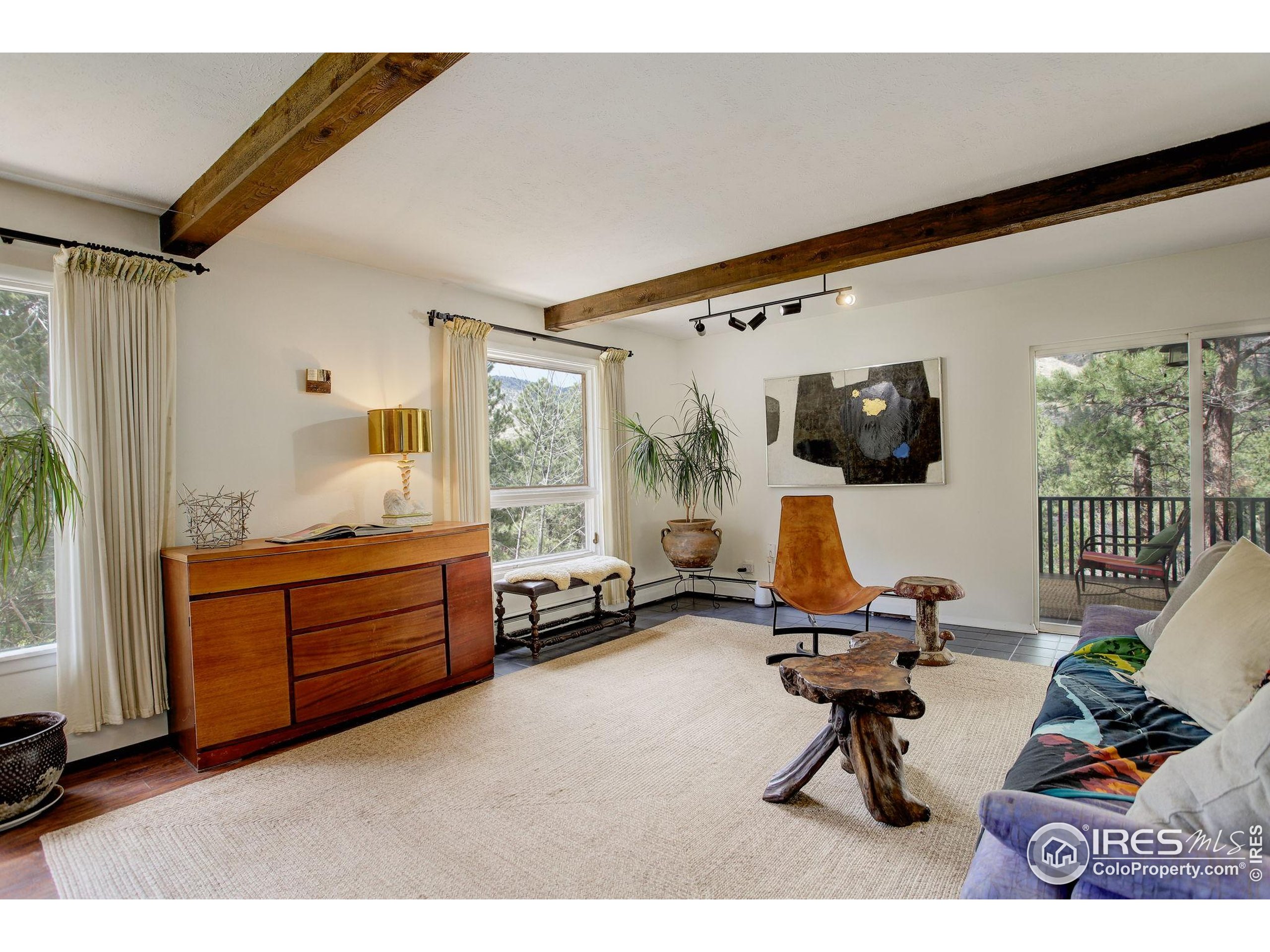 4 Porphyry View Jamestown, CO 80455 - Photo 6 of 36 a bed room with furniture and a window