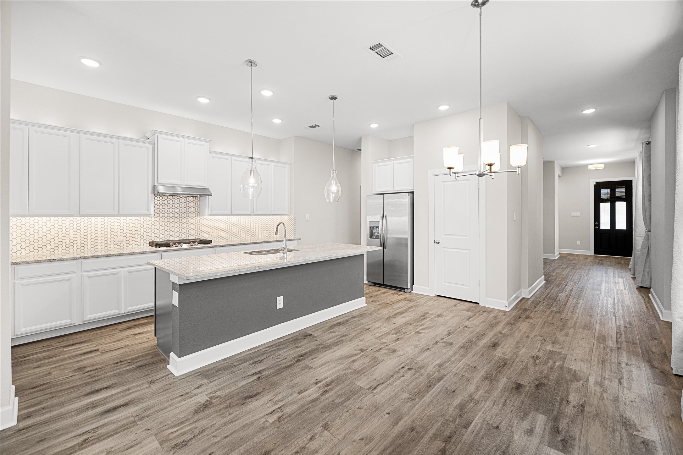15611 Rising Wren Court Conroe, TX 77302 - Photo 9 of 41 Kitchen and Dining Area