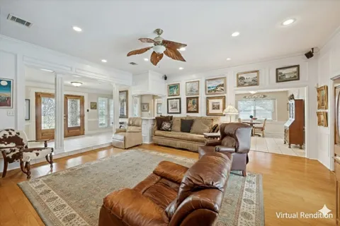 a kitchen with a sink refrigerator and cabinets
