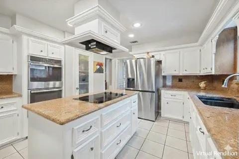 a bedroom with furniture and wooden floor