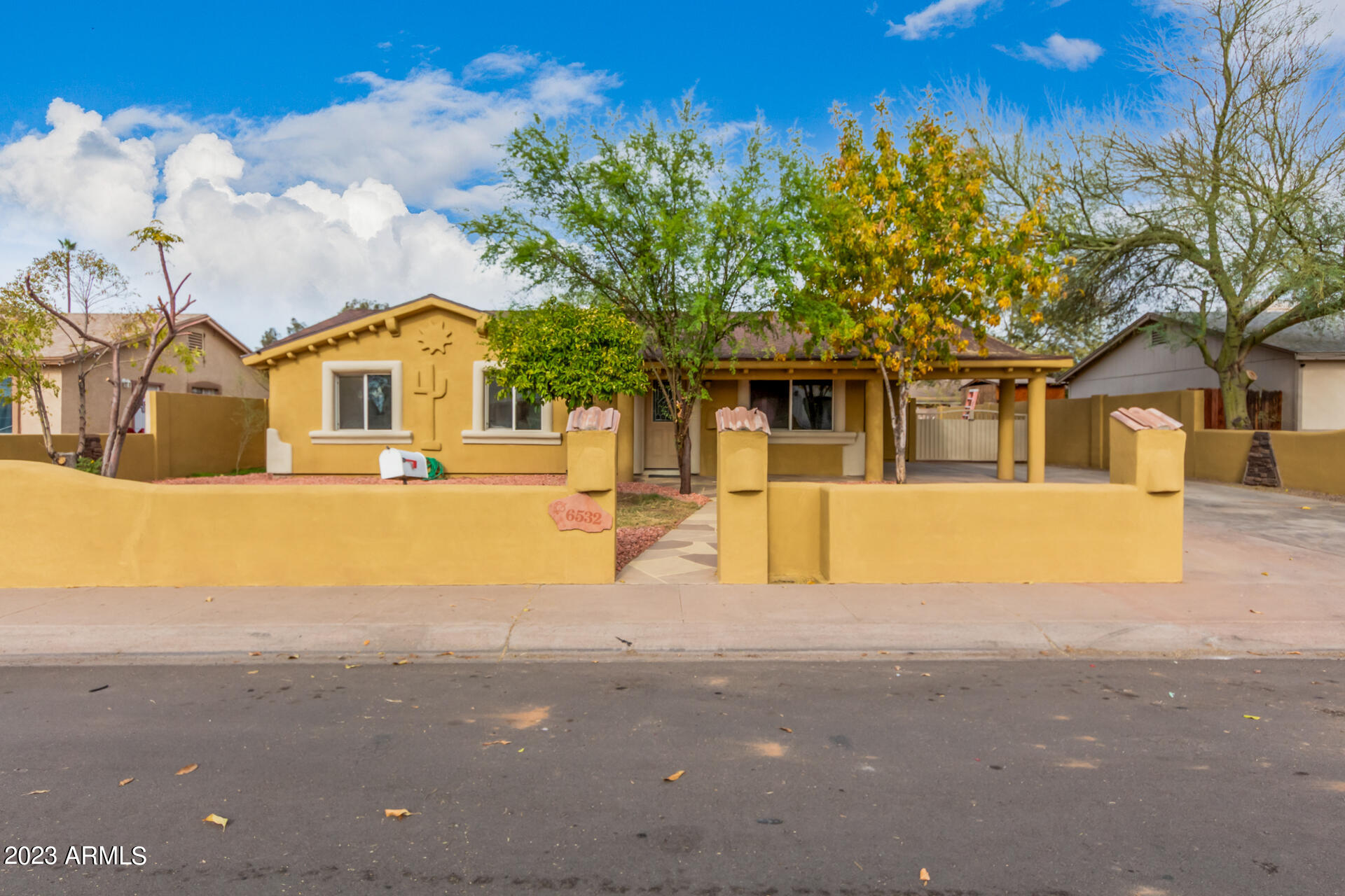 6532 West Granada Road Phoenix, AZ 85035 - Photo 1 of 31 a view of house with yard