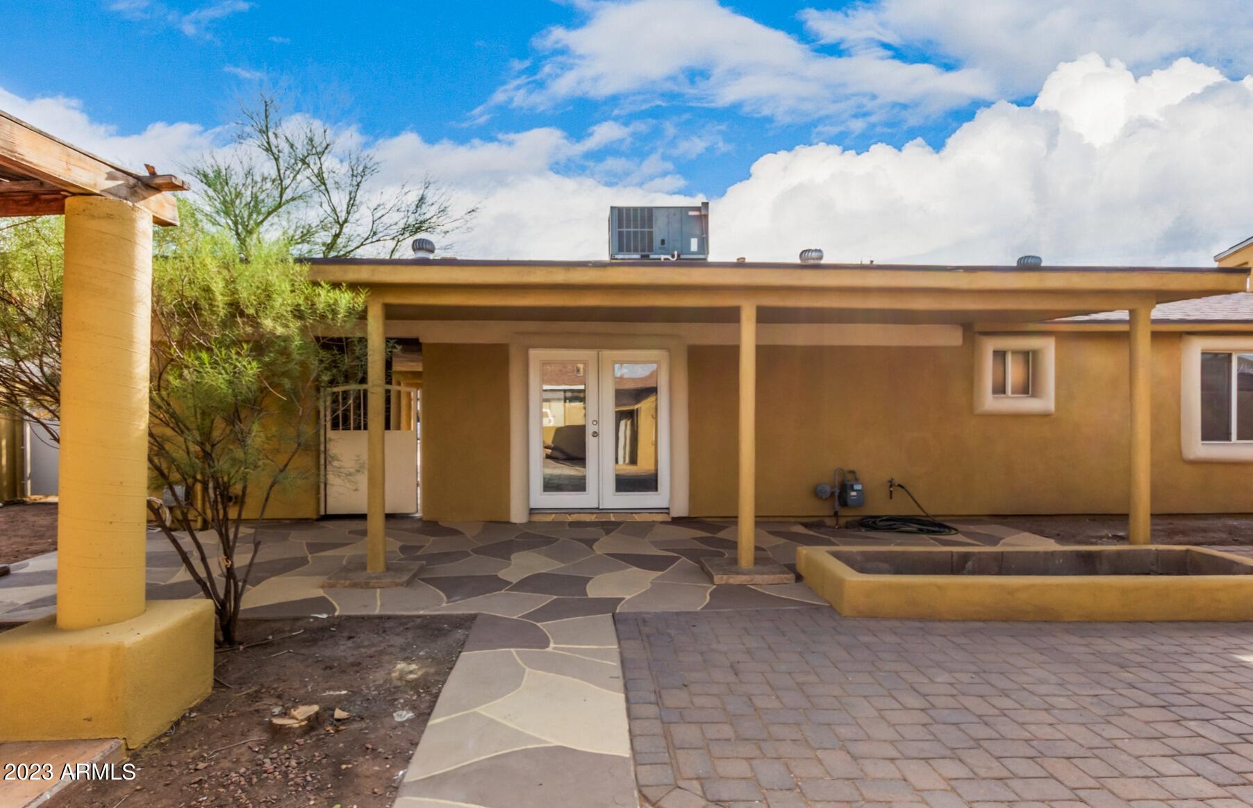 6532 West Granada Road Phoenix, AZ 85035 - Photo 31 of 31 a view of a house with backyard and sitting area