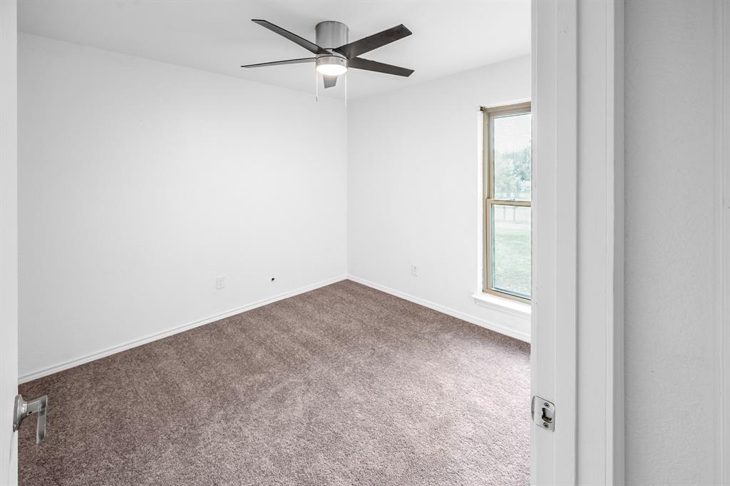 2218 Fuqua Road Rowlett, TX 75088 - Photo 17 of 30 a view of an empty room