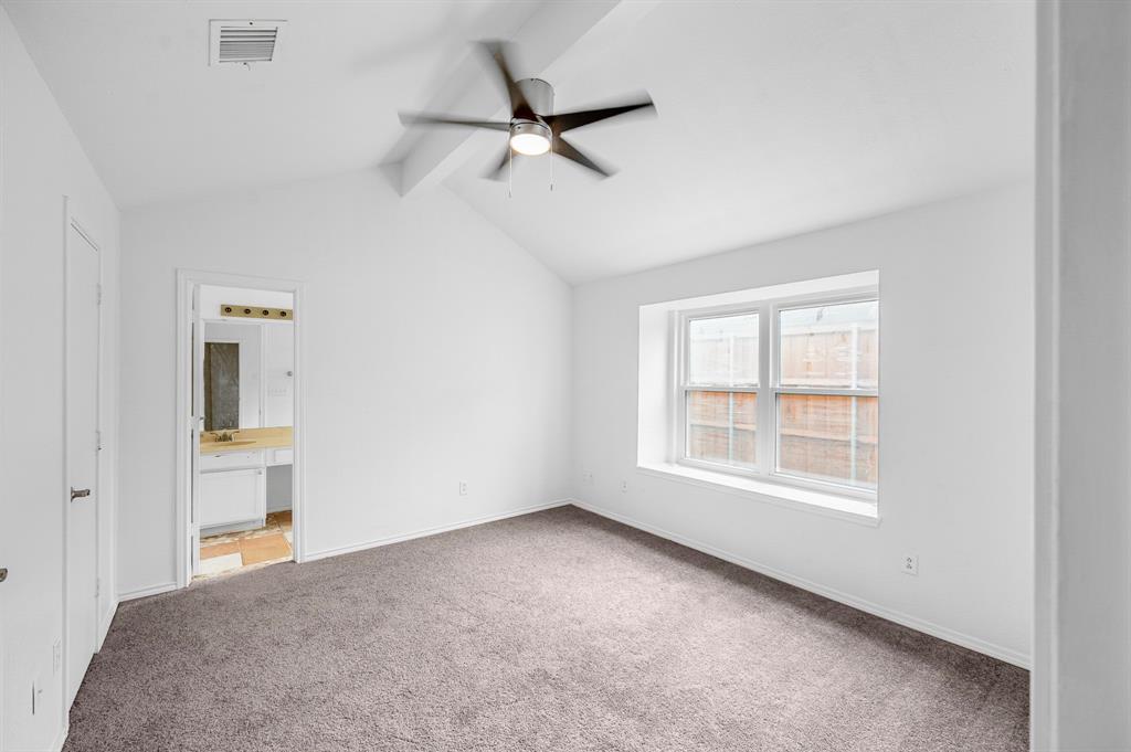 2218 Fuqua Road Rowlett, TX 75088 - Photo 19 of 30 an empty room with a window and a ceiling fan