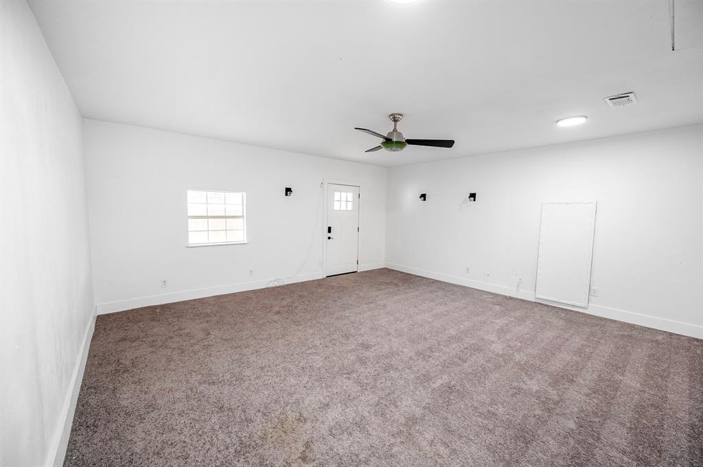 2218 Fuqua Road Rowlett, TX 75088 - Photo 24 of 30 a view of an empty room with a window