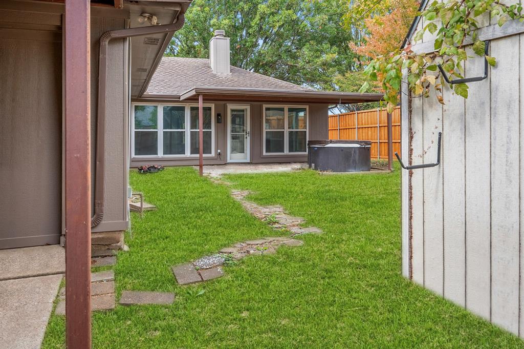 2218 Fuqua Road Rowlett, TX 75088 - Photo 28 of 30 a view of a house with backyard