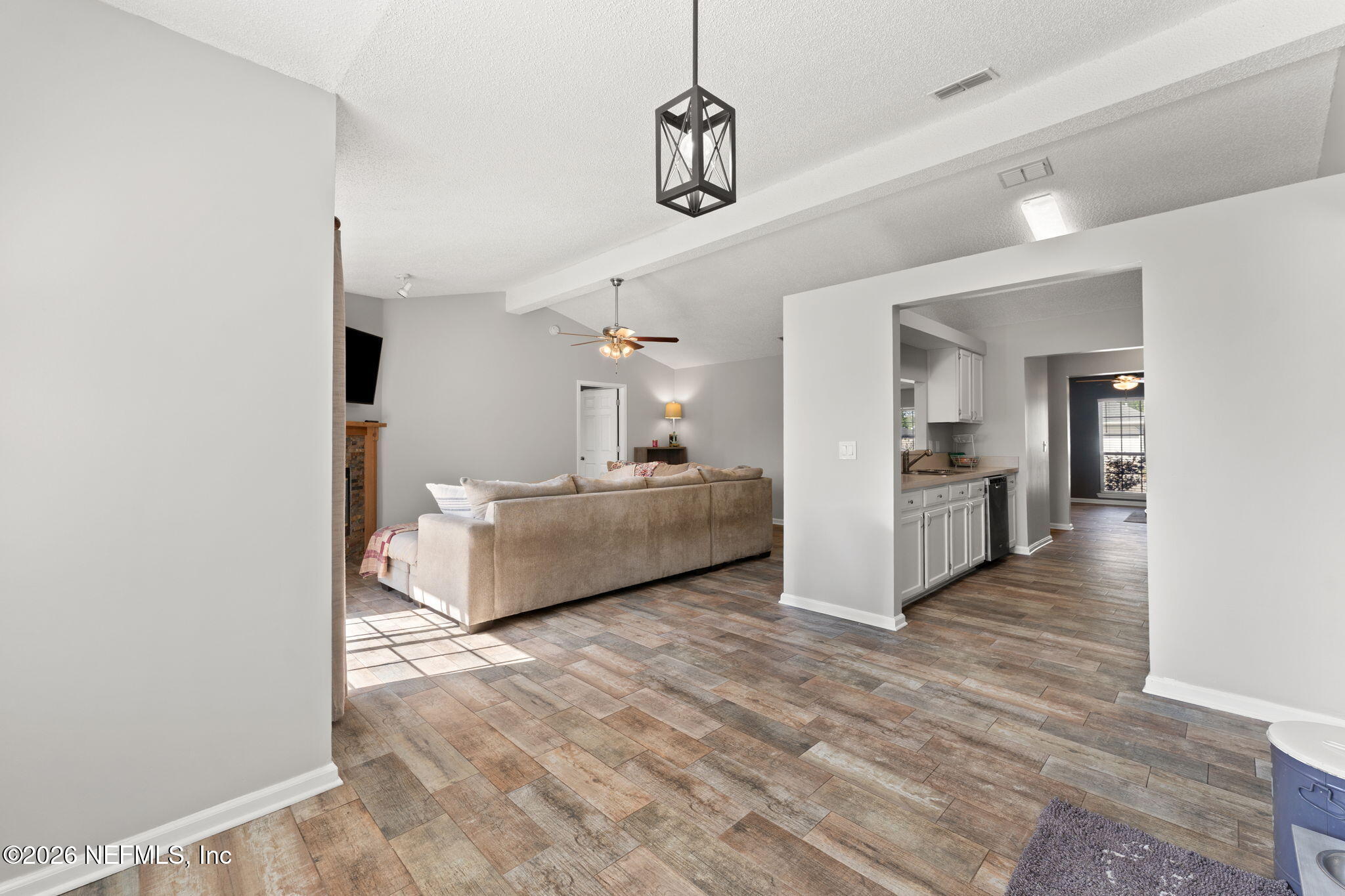2982 Chief Ridaught Trail Middleburg, FL 32068 - Photo 15 of 29 a living room with furniture and kitchen view
