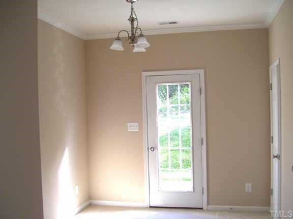 6823 Spanglers Spring Way Raleigh, NC 27610 - Photo 6 of 10 a view of a livingroom with a window