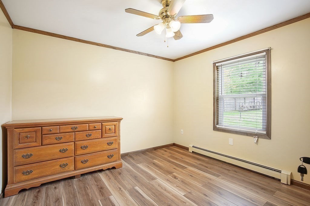 113 Batchelor Street Granby, MA 01033 - Photo 17 of 37 a view of a livingroom with a dresser