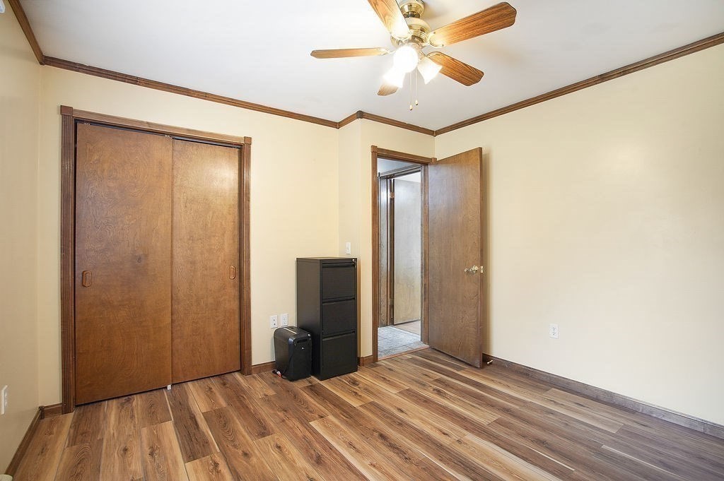 113 Batchelor Street Granby, MA 01033 - Photo 18 of 37 a view of a livingroom with wooden floor
