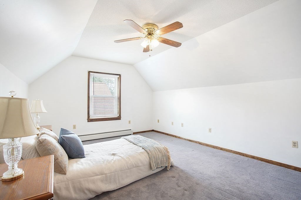 113 Batchelor Street Granby, MA 01033 - Photo 20 of 37 a bedroom with a bed and window