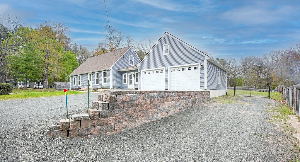 113 Batchelor Street Granby, MA 01033 - Photo 2 of 37 a house view with a outdoor space