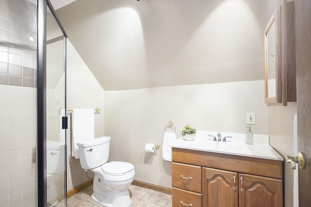 113 Batchelor Street Granby, MA 01033 - Photo 24 of 37 a bathroom with a sink mirror vanity and toilet