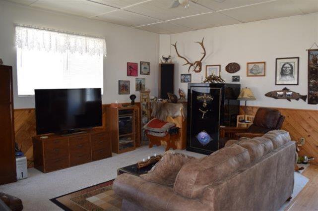 2661 Bransom Road Central Point, OR 97502 - Photo 18 of 25 a living room with furniture and a flat screen tv