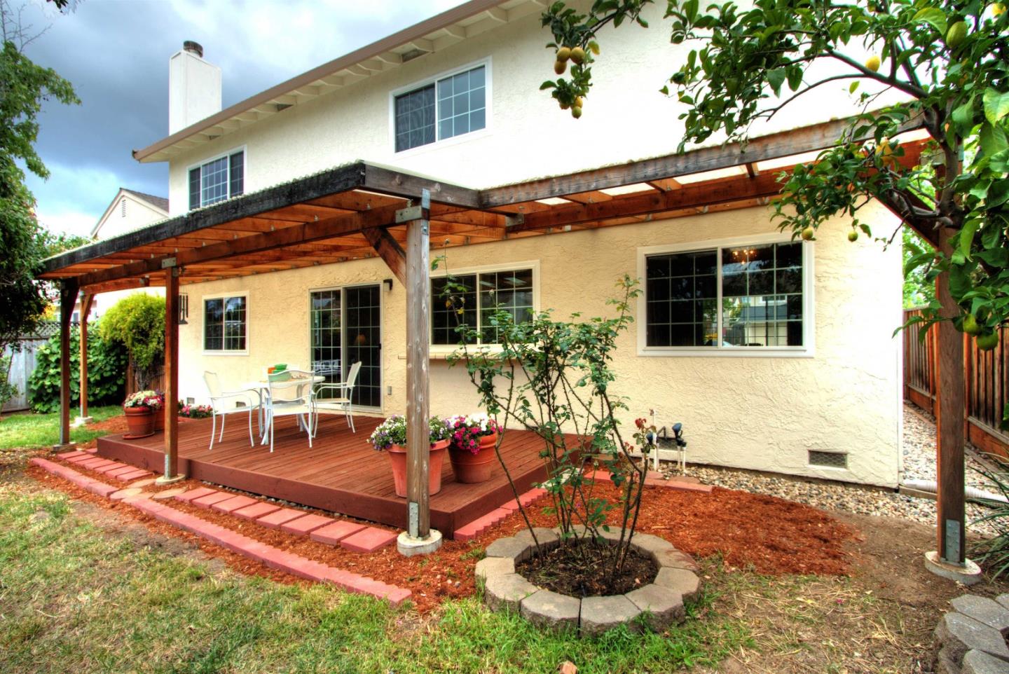 2708 Glen Ferguson Circle San Jose, CA 95148 - Photo 23 of 23 a view of a house with backyard porch and patio