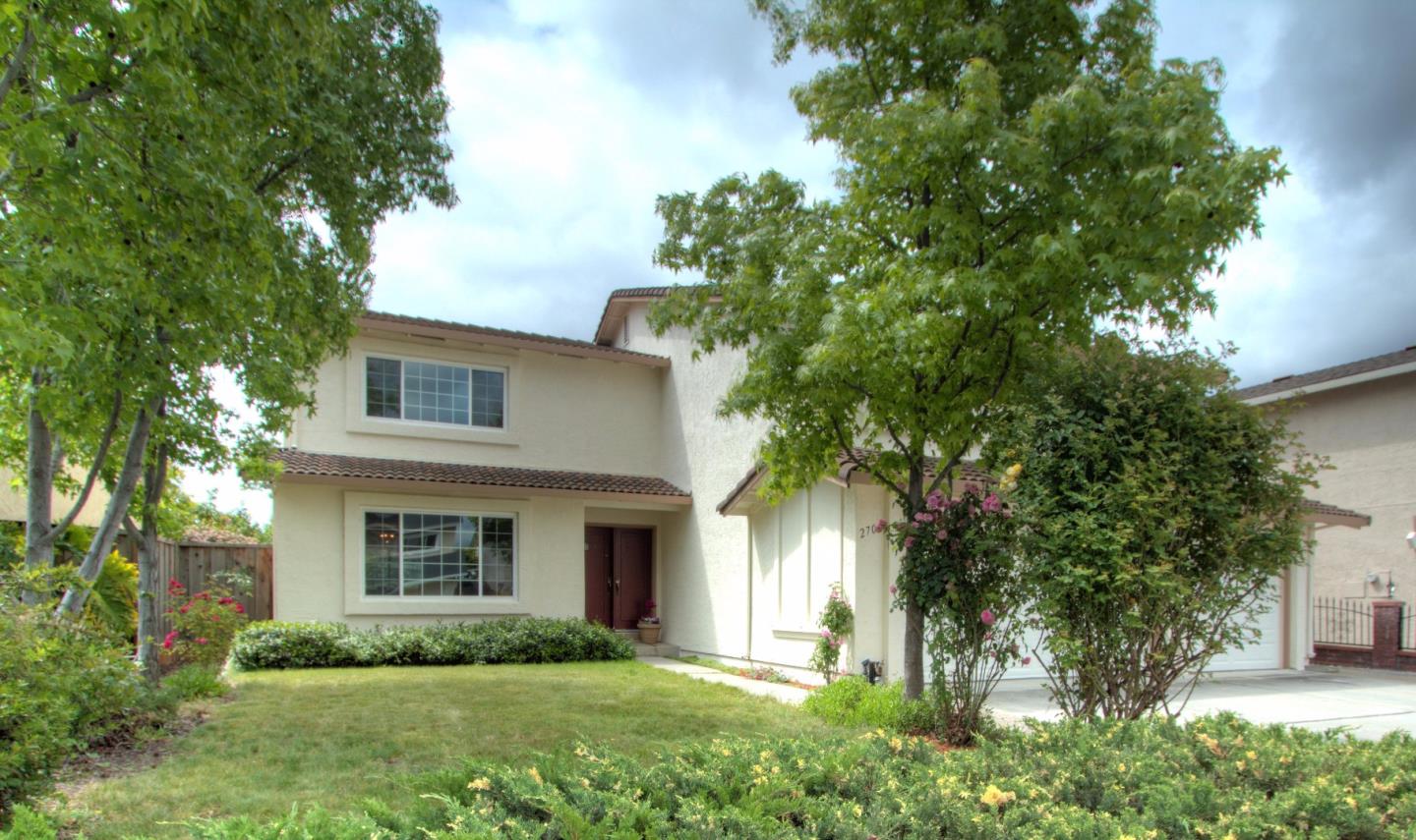 2708 Glen Ferguson Circle San Jose, CA 95148 - Photo 3 of 23 a front view of a house with a yard